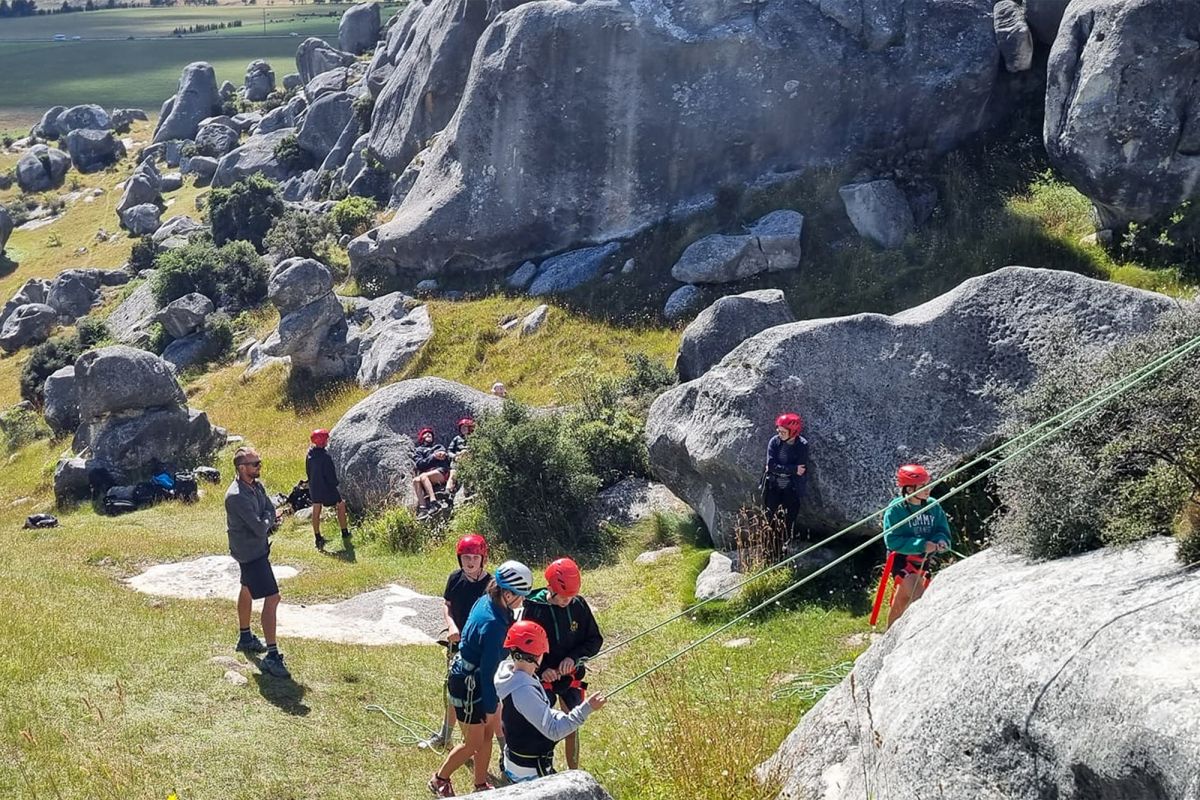 New boarding students abseiling at Castle Hill, Canterbury.
