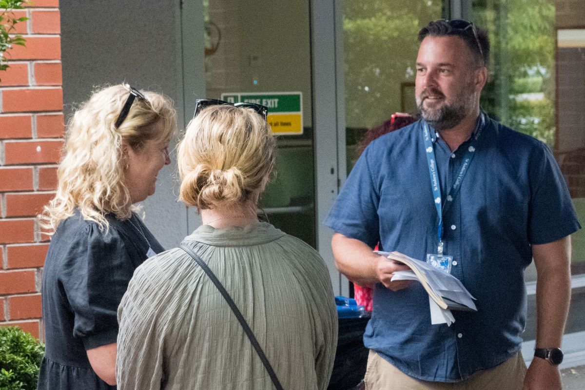 Director of Boarding talking with parents.