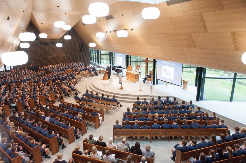 St Andrew's College Centennial Chapel interior with students at a service