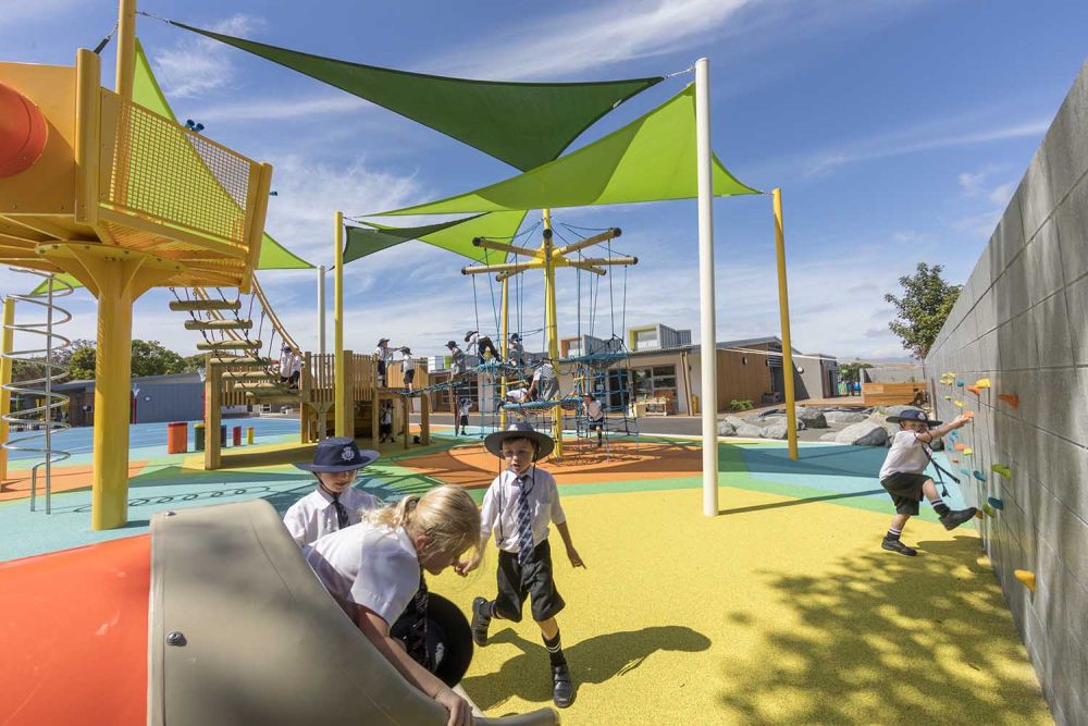 Children playing on Junior School playground at StAC