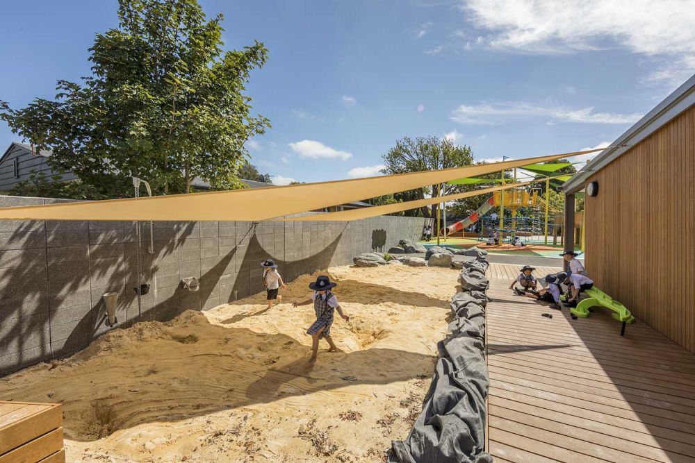 Children playing in Junior School sandpit at StAC