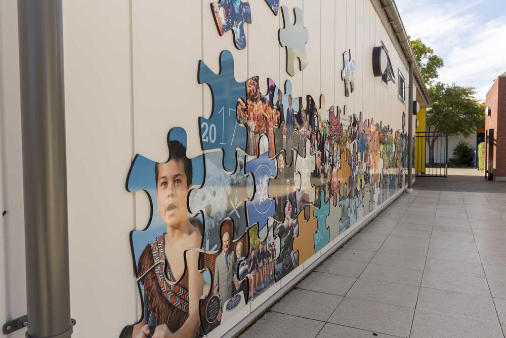 Stewart Junior Centre timeline jigsaw wall display at St Andrew's College