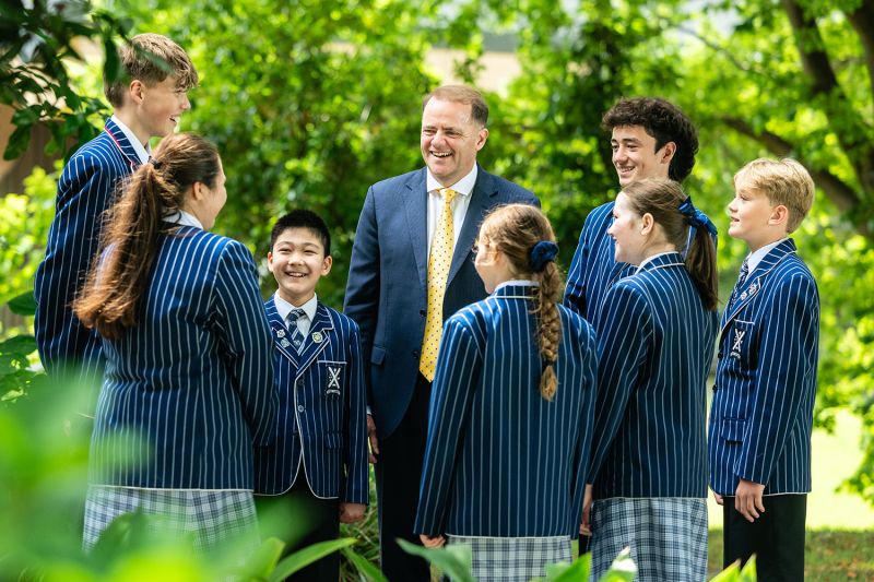 St Andrew's College Rector Mark Wilson and students.