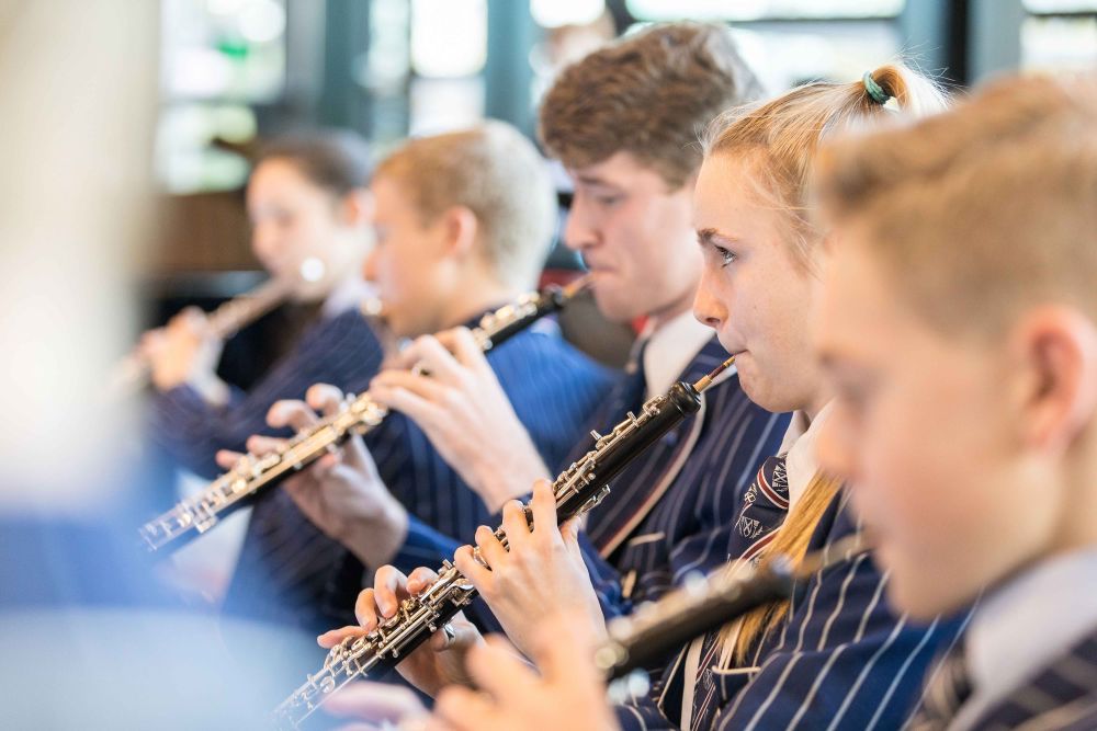 Group of students playing the clarinet