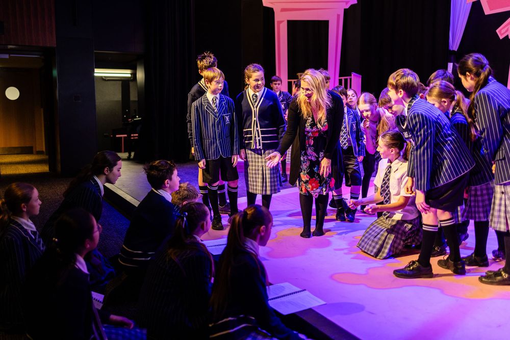 St Andrew's College students and teacher rehearsing at the Gough Family Theatre - Ngā Toi Performing Arts Centre