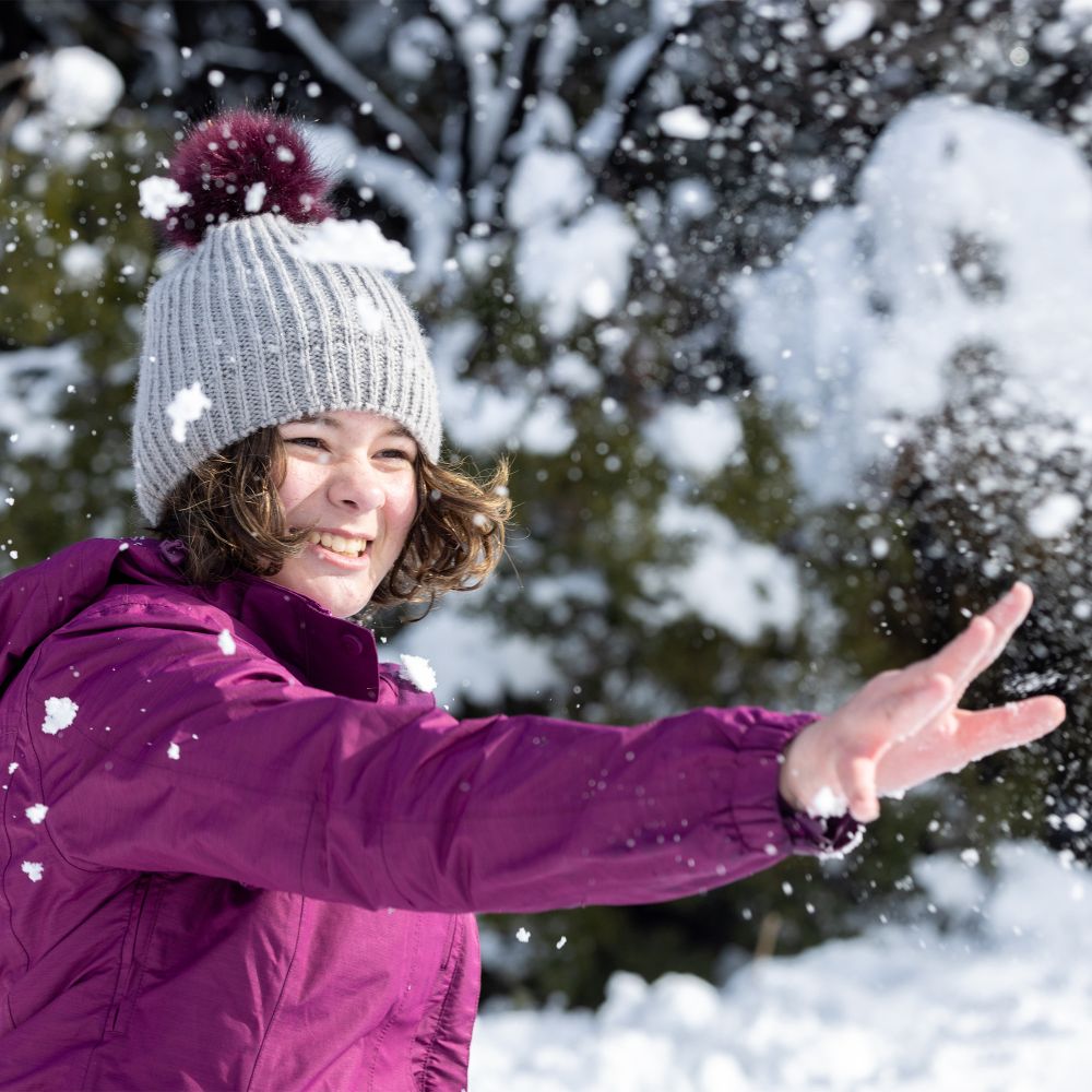 Student in the snow at Castle Hill.