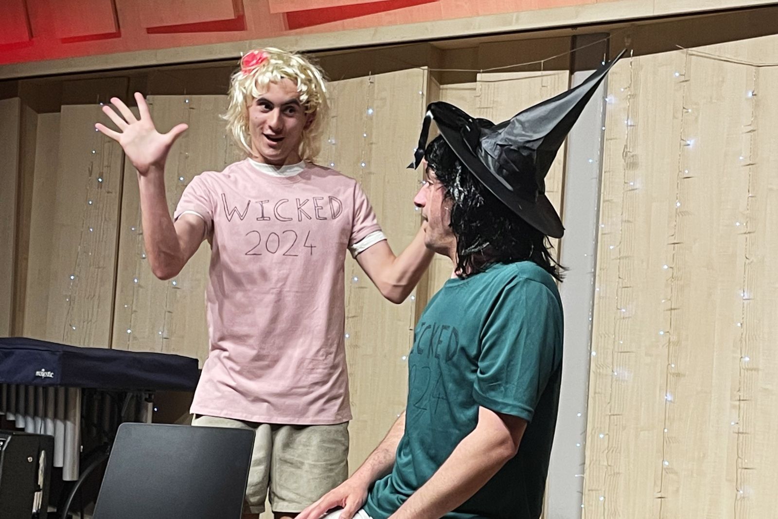 Student and teacher performing theatresports