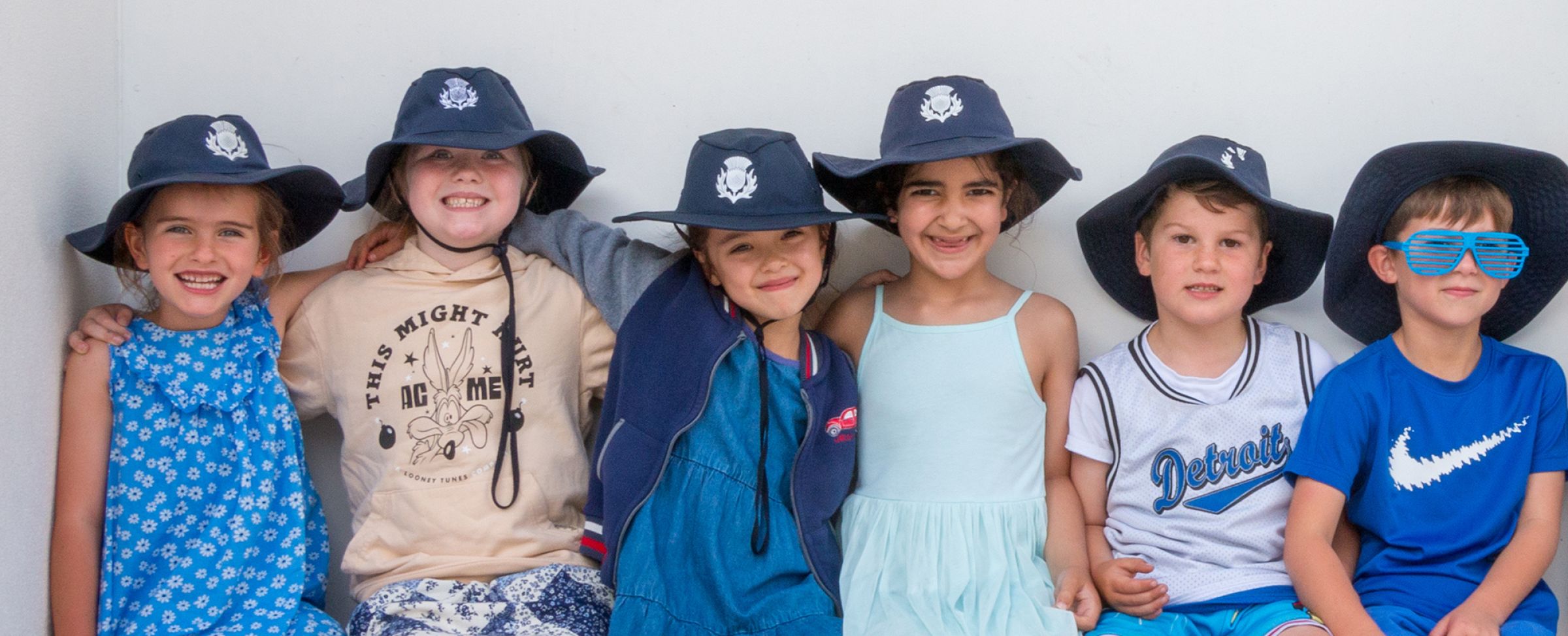 Preparatory student in blue for a charity day.