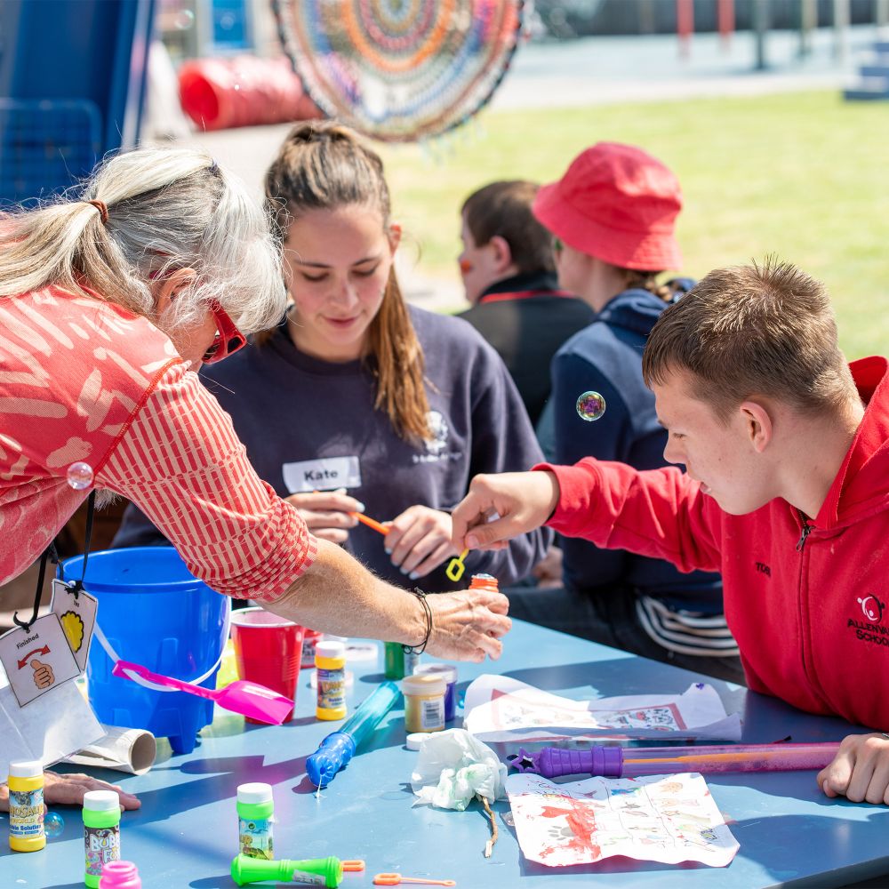 Prefects volunteering at a school.