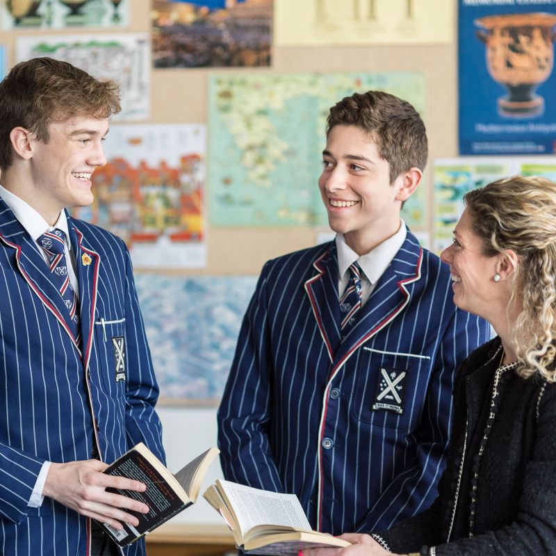 Senior College students with a teacher in the classroom.