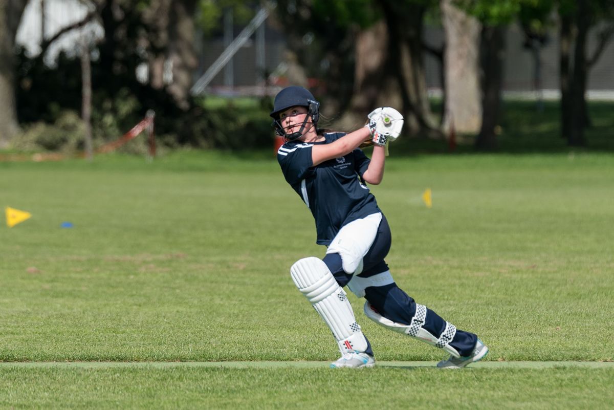 Secondary girls cricket game.