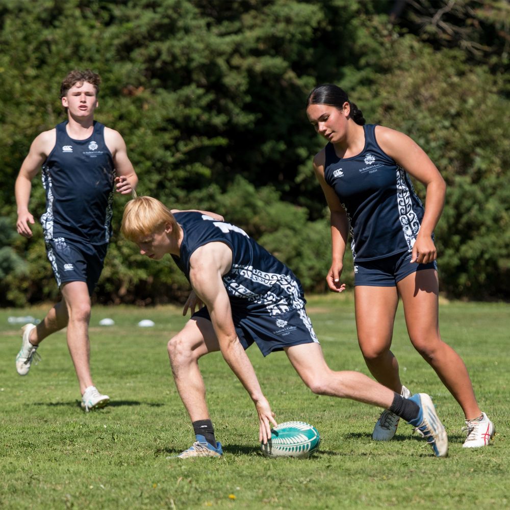 Mixed touch rugby game.