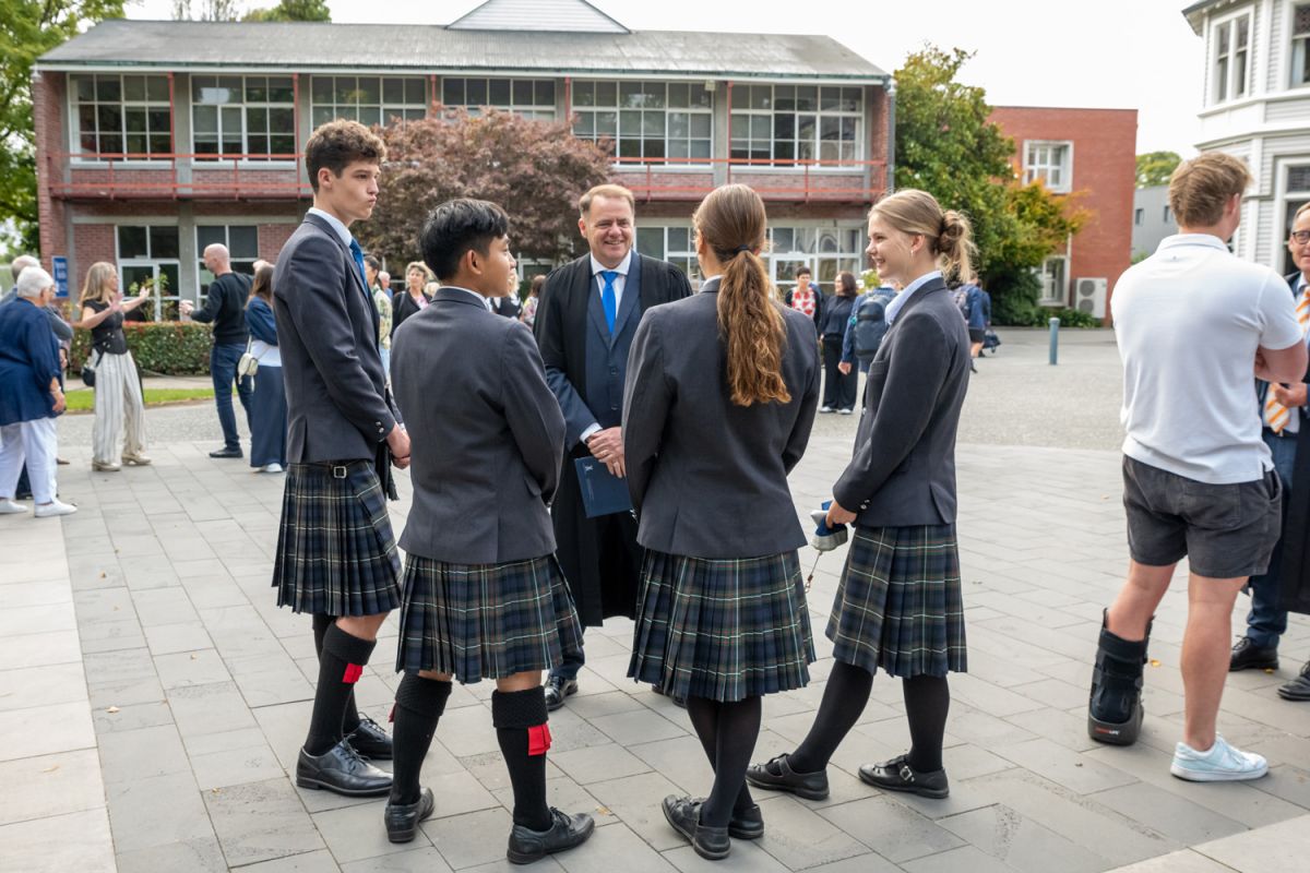 St Andrew's College Rector, Mark Wilson with the Heads of College before the 2025 Leadership Assembly.