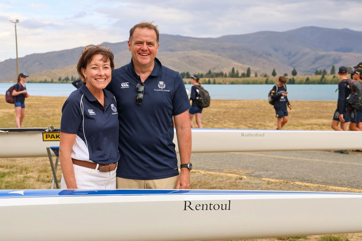 St Andrew's College Rector, Mark Wilson and his wife Judi at Lake Ruataniwha, at the 2025 boat naming ceremony for two new Hudson fours for the rowing team.