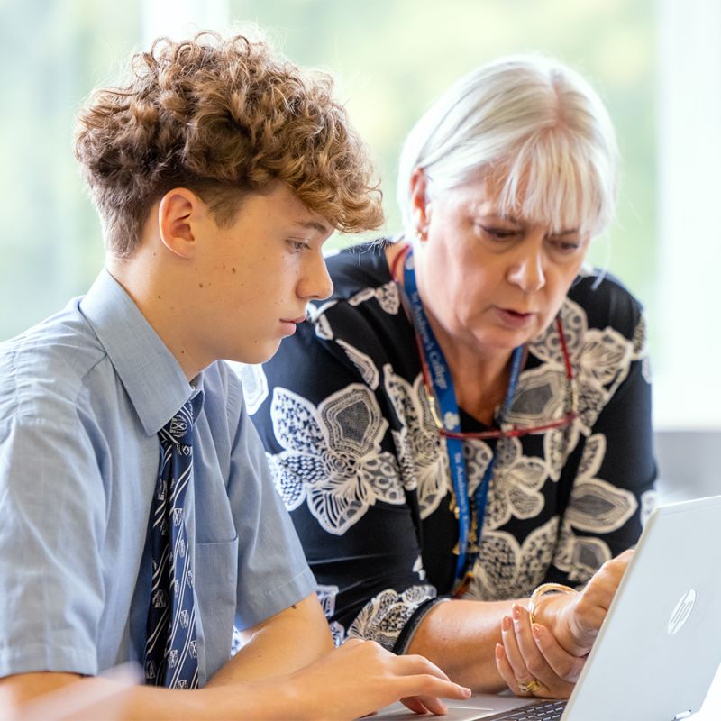 Teacher with a Middle School student.