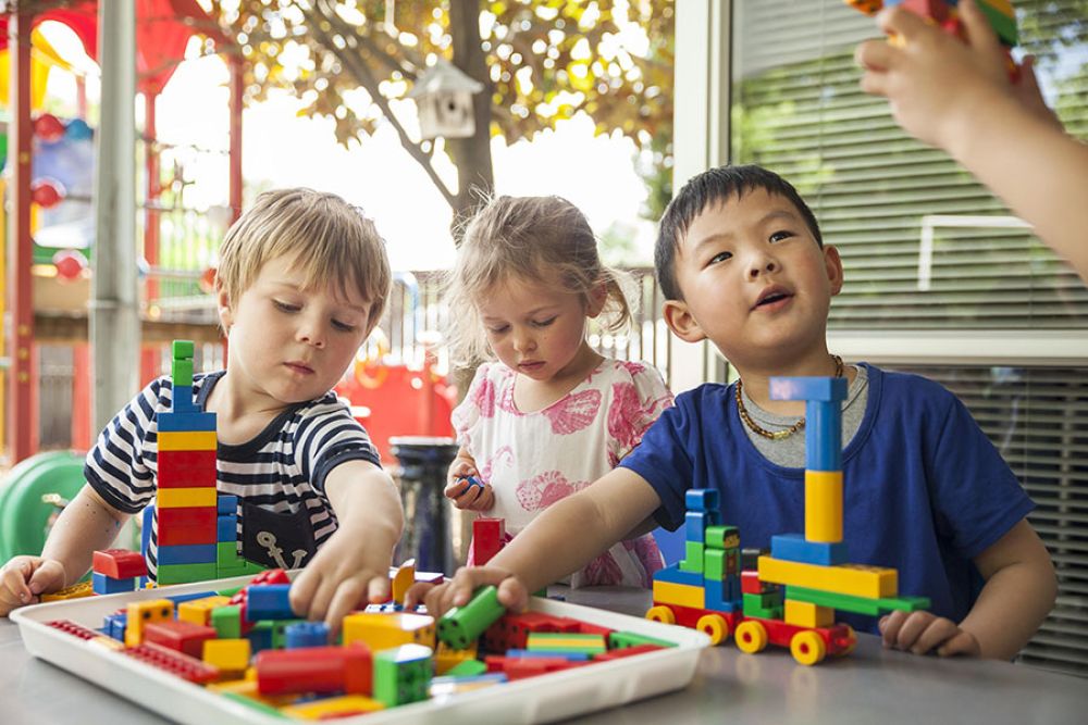 Children playing with Lego.