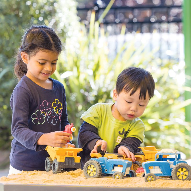 Children playing in the sandpit at pre-school.