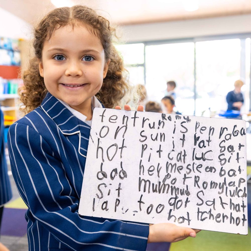St Andrew's College Preparatory School student showing her work
