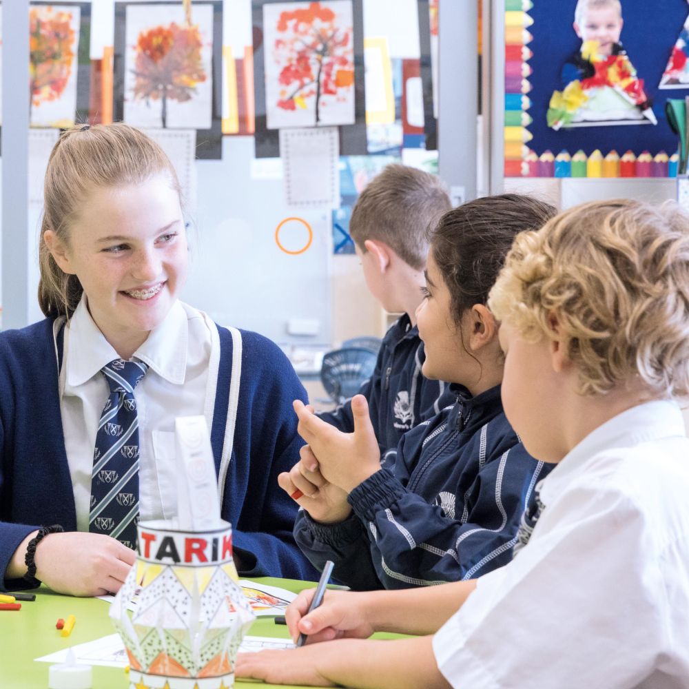 Preparatory students doing art at desk