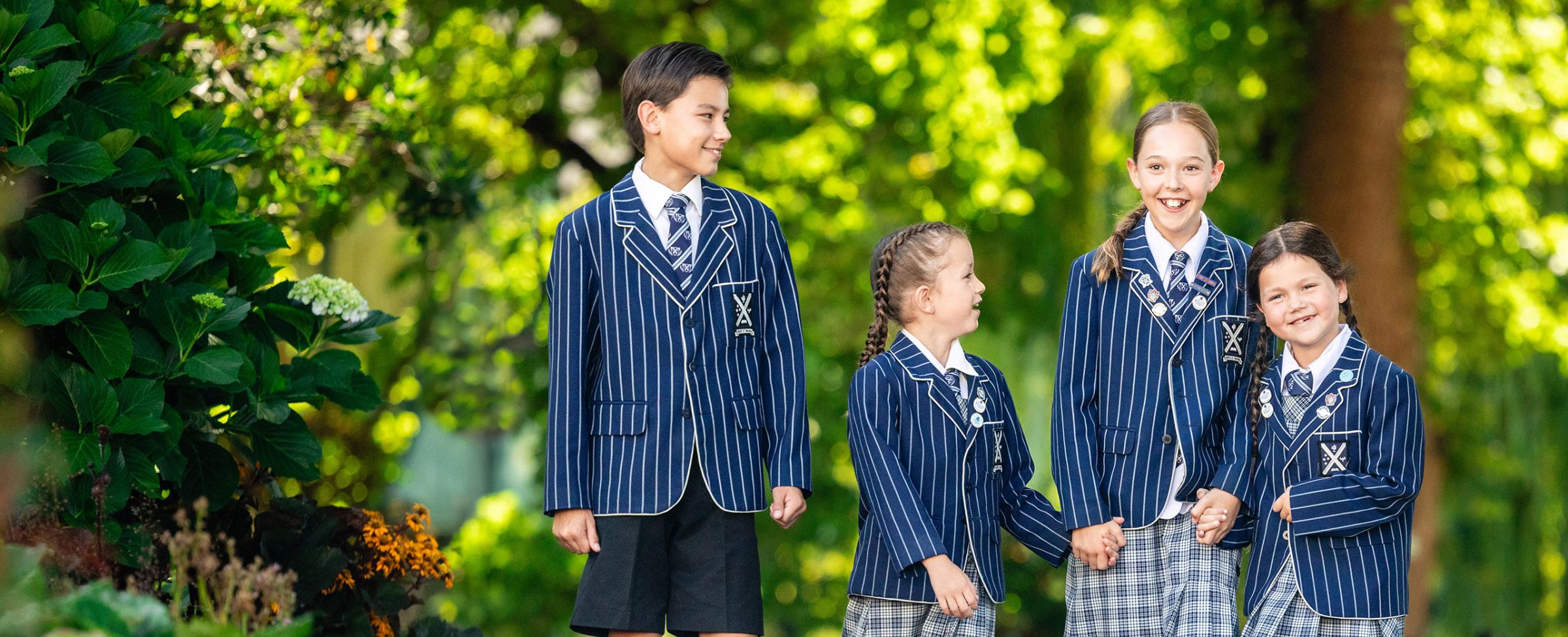 Preparatory students walking through the campus chatting