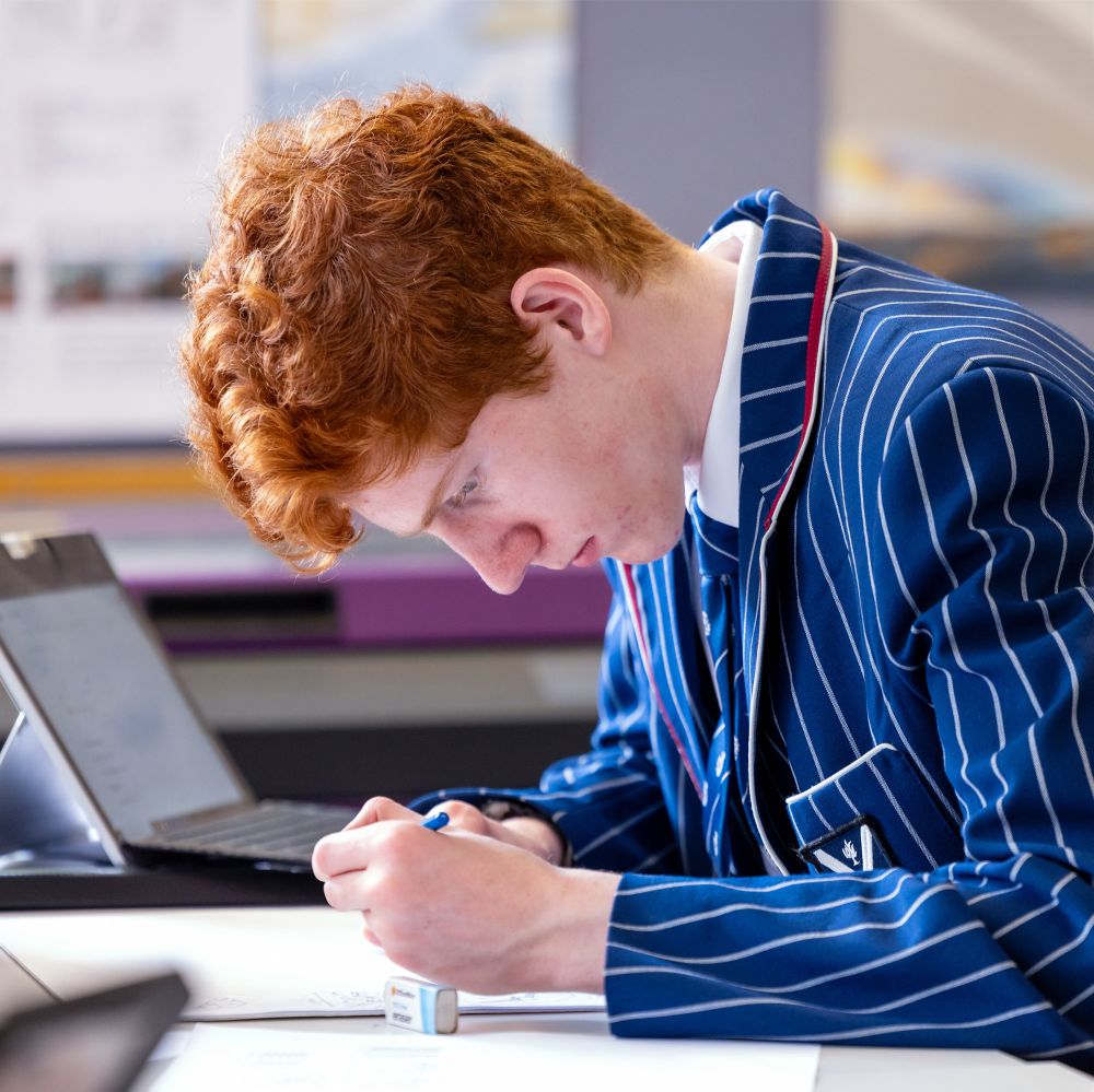 Senior College student in class.