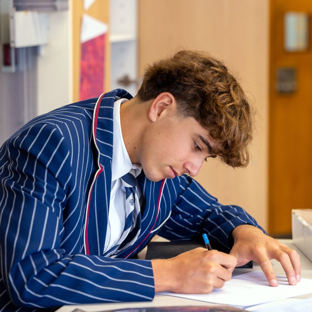 Senior College student in class.