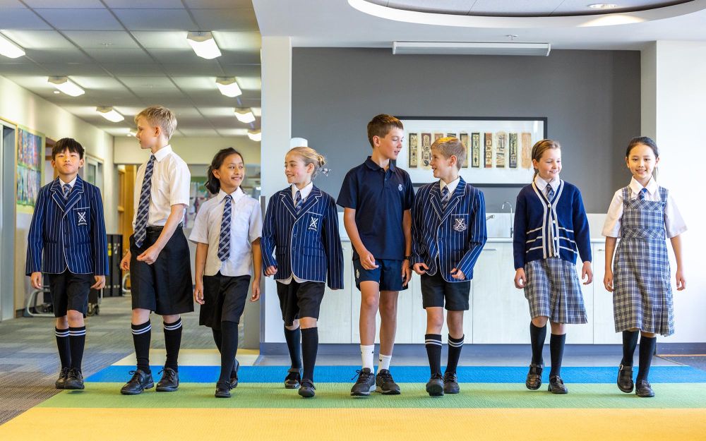 St Andrew's College students in Preparatory School uniform.