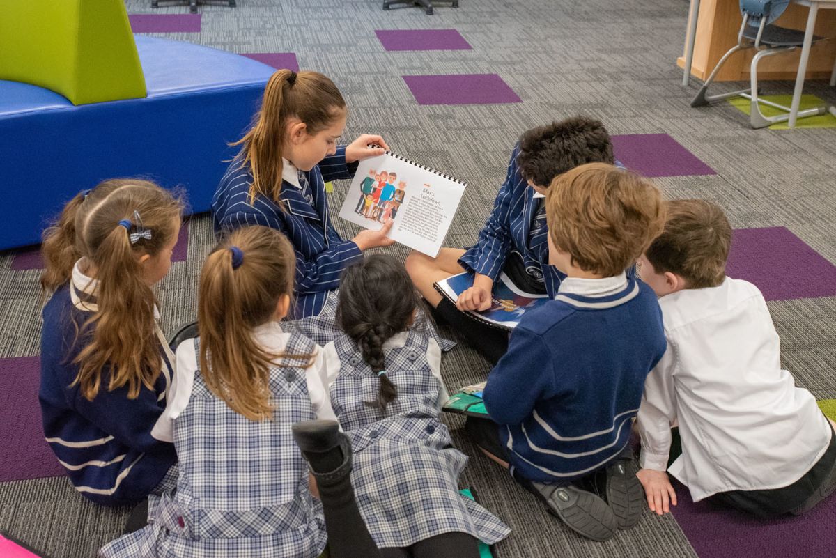 Preparatory school students studying in the library together