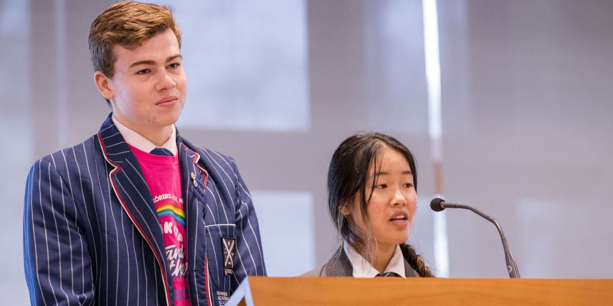 Heads of well-being speaking at assembly on pink shirt day