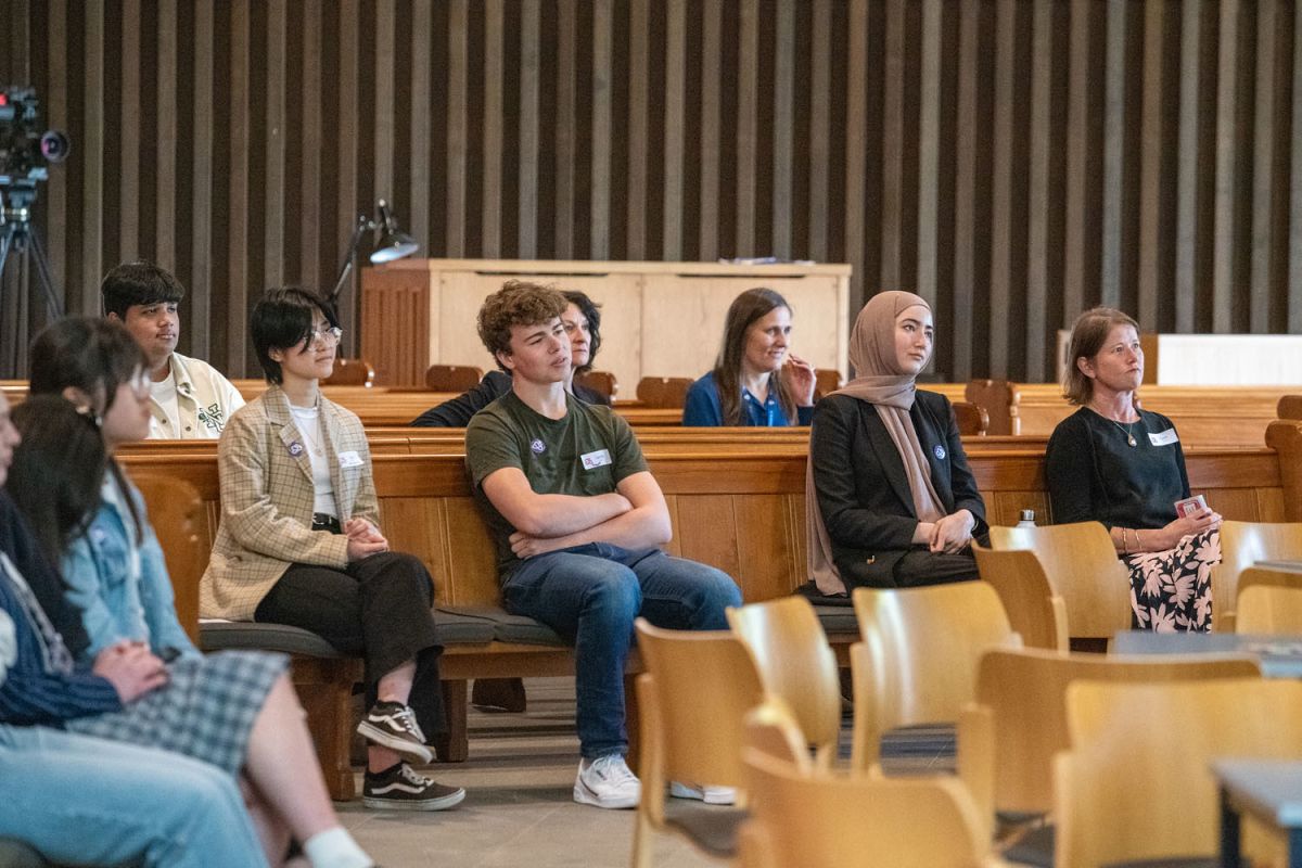 students listening to mahia te aroha speakers