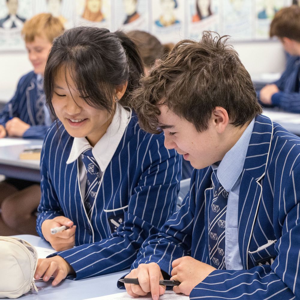 Co-ed students in the classroom.